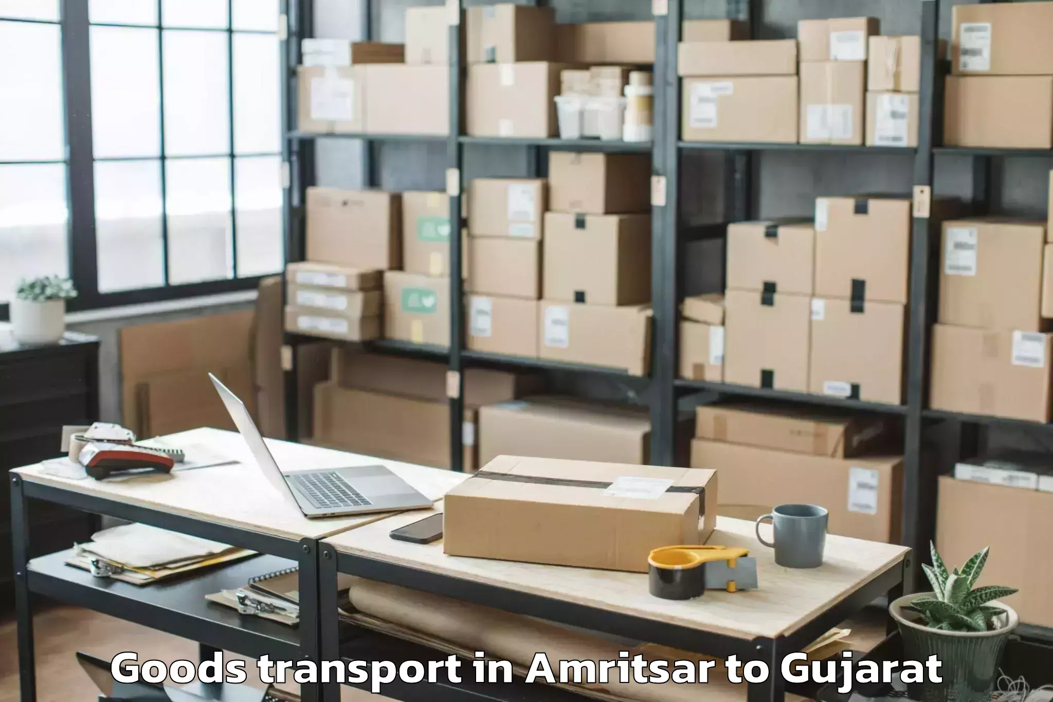 Top Amritsar to Khambhalia Goods Transport Available